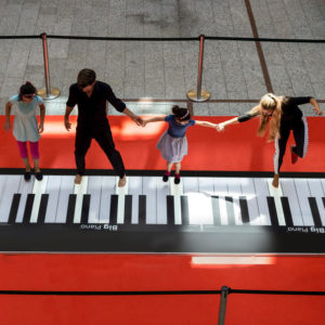 giant piano performers, big piano performers, pianists, piano, mall piano, dancing piano, dancers on piano