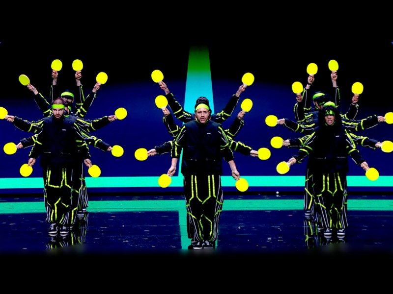 team building entertainment, corporate event show, synchronized performance, sports entertainment, interactive stage show, LED performance act, team spirit event, ping pong show, innovative event entertainment, corporate entertainment ideas
